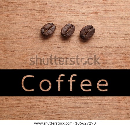 Coffee banner with Roasted Coffee beans on wood texture background