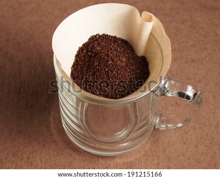 Preparing Grindded coffee crop on paper filter