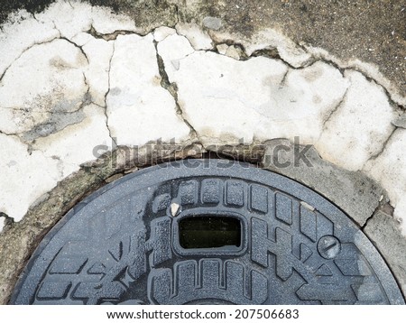 wet manhole cover plate and crack concrete
