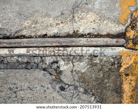 crack concrete floor with corroded pipe texture background