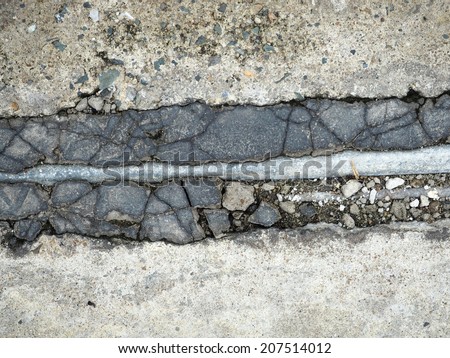 crack concrete floor with corroded pipe texture background
