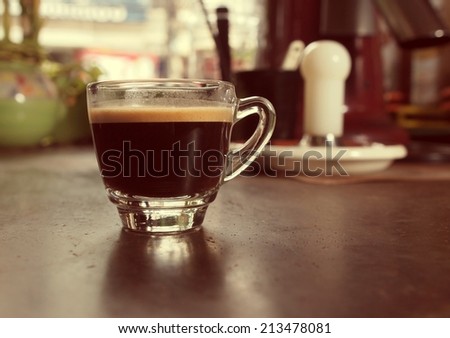 Cup of hot fresh espresso coffee, vintage color