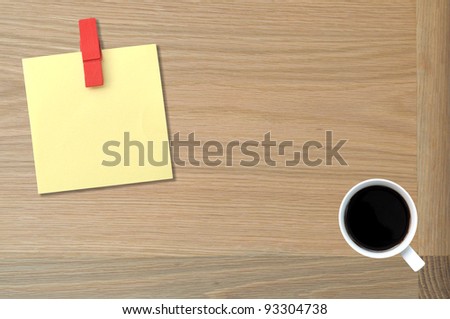 reminder note (post it note) on table with coffee