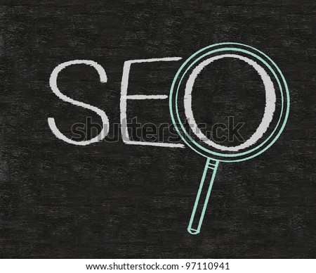 Search Engine Optimization SEO written on blackboard background