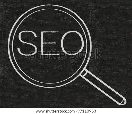 Search Engine Optimization SEO written on blackboard background