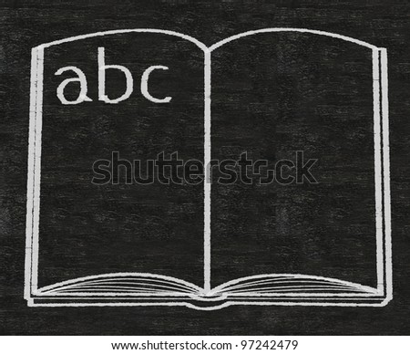 book with abc alphabet written on blackboard background