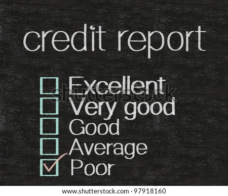 credit report written with rate on blackboard background