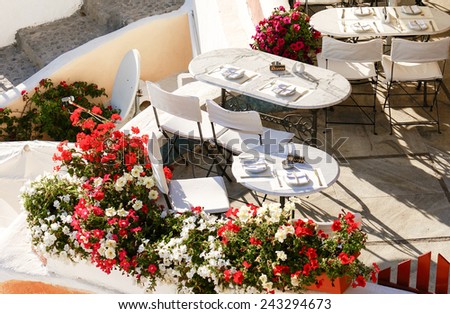 Dinner time on terrace in Santorini island, Greece