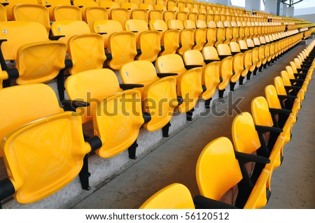 yellow seat in football stadium