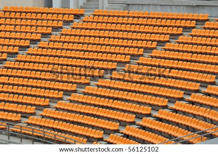 stock-photo-empty-orange-seat-in-soccer-stadium-56125102.jpg