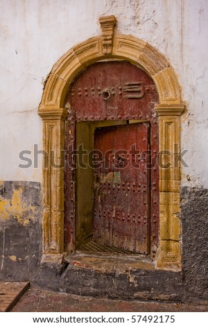 Old half-opened door in Casablanca, Morocco.