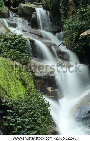 Huay Kaew Waterfall, Paradise waterfall in Tropical rain forest of Thailand , deep forest water fall in Chaingrai