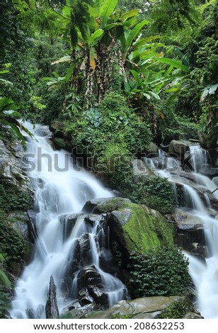 Huay Kaew Waterfall, Paradise waterfall in Tropical rain forest of Thailand , deep forest water fall in Chaingrai