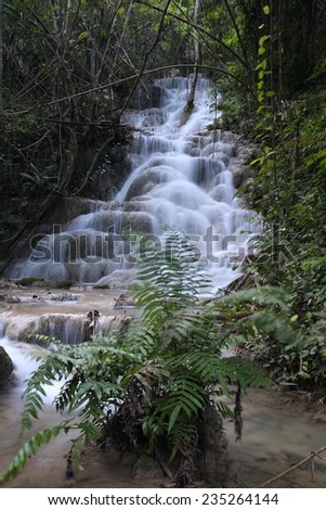 Pukang  Waterfall, Paradise waterfall in Tropical rain forest of Thailand  ,  water fall in deep forest at  border of Chaing rai and phayao province Thailand .