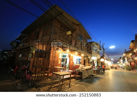 Loei, THAILAND - FEB 3: Unidentified old house and people on a walking Street on Feb 3, 2015 in Chaing Khan,Loei .Walking Street is a popular attraction. Almost 20 million tourists visited Thailand .