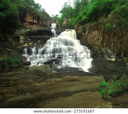 Chart Trakan Waterfall, Paradise waterfall in Tropical rain forest of Thailand , water fall in deep forest at Pitsanolok province Thailand .