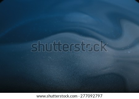 abstract background of water wave on rough blue metal , abstract of reflection of  blue sky and white cloud on grunge metal texture