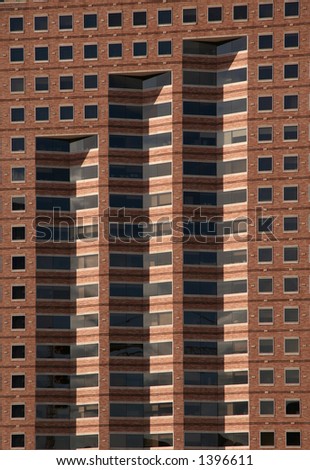 Interesting pattern formed by windows of a modern highrise building