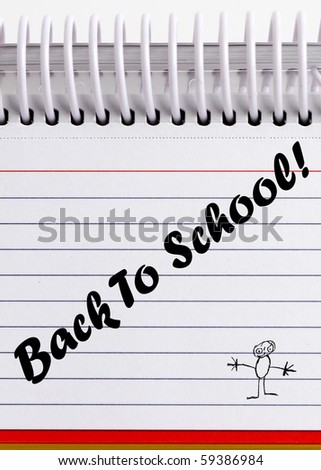 Back to school. The words Back to School written on a index card/notepad.