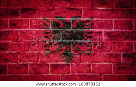 Collection of european flag on old brick wall texture background, Albania