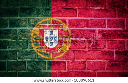 Collection of european flag on old brick wall texture background, Portugal