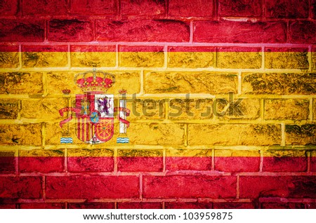 Collection of european flag on old brick wall texture background, Spain