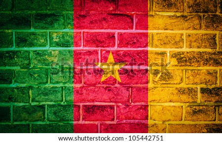 Collection of european flag on old brick wall texture background, cameroon