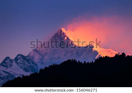 The Majestic Kanchenjunga Range Of The Himalayas At First Light Of Sunrise At Sikkim , India