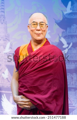 BANGKOK - OCT 21: A waxwork of Dalai Lama on display at Madame Tussauds on Oct 21, 2012 in Bangkok, Thailand. Madame Tussauds\' newest branch hosts waxworks of numerous stars and celebrities.