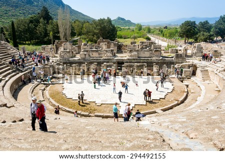 EPHESUS, TURKEY - APRIL 13 : Tourists on Amphitheater (Coliseum) in Ephesus Turkey on April 13, 2015. Ephesus contains the ancient largest collection of Roman ruins in the eastern Mediterranean.