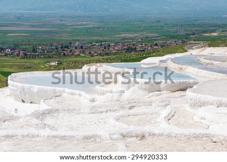Natural travertine pools and terraces at Pamukkale ,Turkey. Pamukkale, meaning 