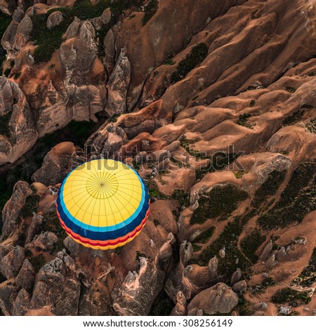 Balloon flight over ancient rock field at Cappadocia,Turkey. Cappadocia is the best places to fly with hot air balloons. Goreme, Cappadocia, Turkey