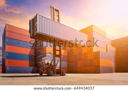 Logistic cargo container in shipping yard with cargo container stack in background. Photo concept for Global business shipping,Logistic,Import and Export industries.