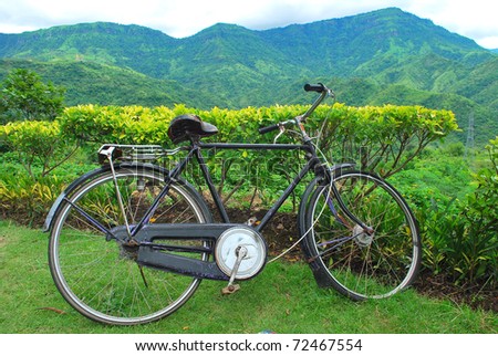 Old bicycle with mountain background