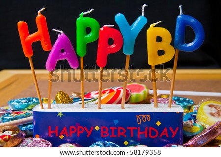 happy birthday candle with colorful candies
