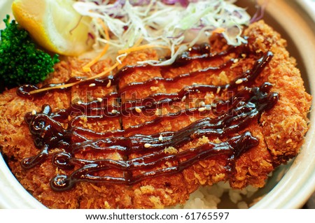Tonkatsu with rice or aka fried pork cutlet with japanese sweet sauce