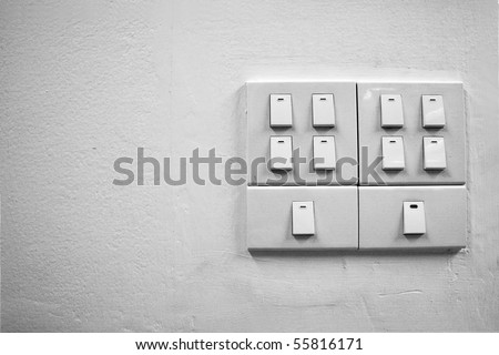 White light switch on wall