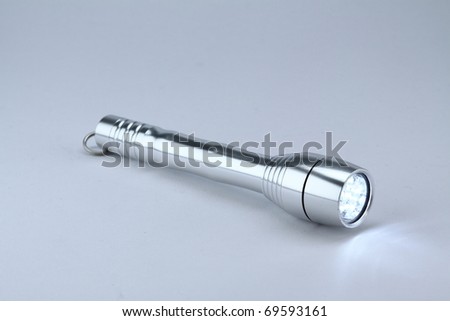 LED pocket torch with beam of light