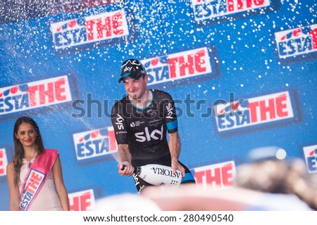 Genova, Italy - May 10 2015: Elia Viviani (TEAM SKY) celebrates on the podium of the second stage Albenga - Genova of Giro D\'italia