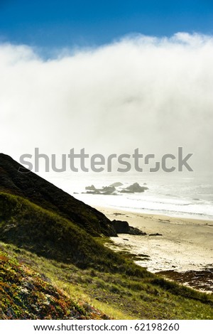 The coastline of Big Sur California often has fog roll in to cover the beach.