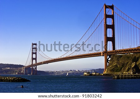 Golden Gate bridge with sculling boat