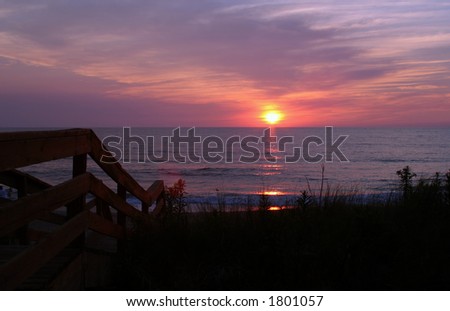 Pink and purple sunrise over the Atlantic ocean.