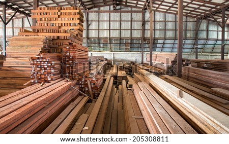 packed warehouse with wood ready for construction