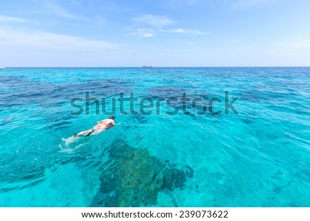 Woman snorkling at Similan Island .Andaman sea thailand, Great for discover plenty of fishes and corals