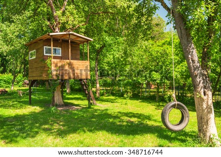 tree house in the evening garden