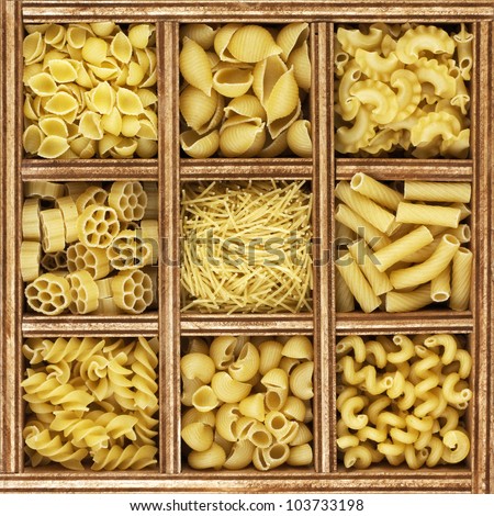 different kinds of italian pasta in wooden box catalog.