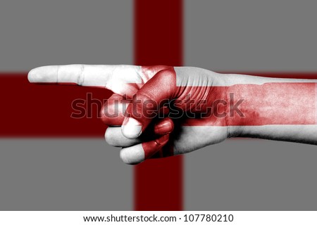 Human hand point with finger in England national flag