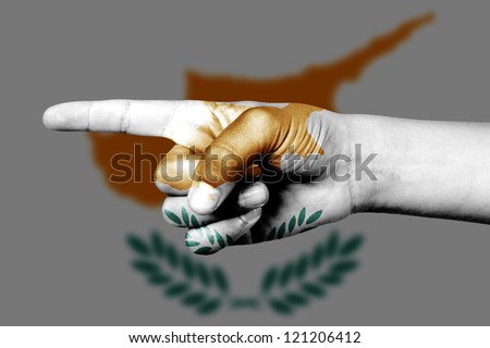 Human hand point with finger in Cyprus national flag
