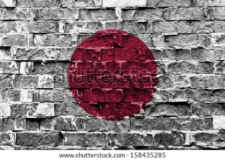 Flag of Japan painted on brick wall