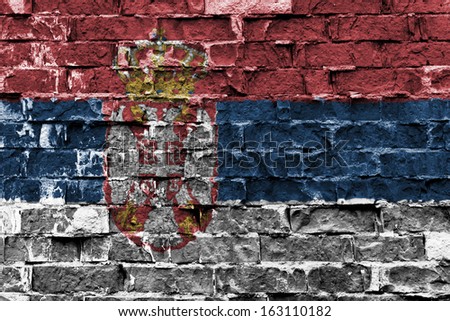 Flag of Serbia painted on brick wall